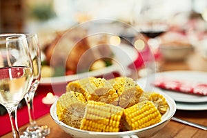 Corn, healthy and lunch on a table for a celebration, Christmas and nutrition in a house. Food, holiday and dinner in