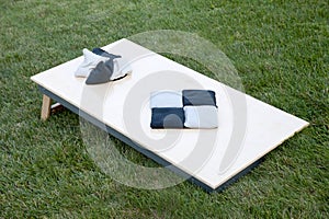 Corn hole boards with bags.