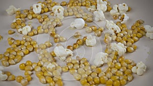 Corn kernels explode in a frying pan