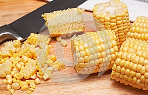 Corn kernels on the wooden board