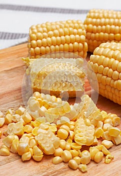 Corn kernels on the wooden board