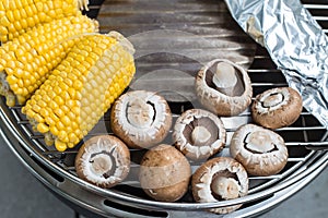 Corn and mushroom on the barbeque