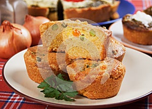 Corn pone filled with vegetables photo