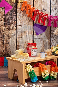 Corn, popcorn and straw hat. Typical table arrangements for the Brazilian Festa Junina - June Festival.