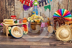 Corn, popcorn and straw hat. Typical table arrangements for the Brazilian Festa Junina - June Festival.