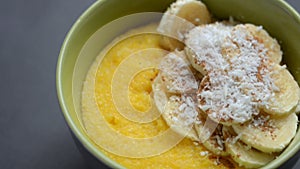 Corn porridge polenta, hominy. Healthy breakfast concept. Food Background