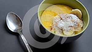 Corn porridge polenta, hominy. Healthy breakfast concept. Food Background