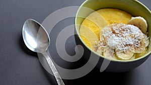 Corn porridge polenta, hominy. Healthy breakfast concept. Food Background