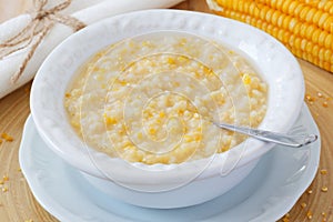 Corn porridge in white plate