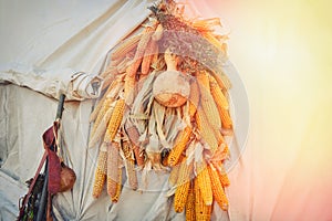 Corn and pumpkins drying on the tent settler in the United States. Historical reconstruction of the life of the first conquerors