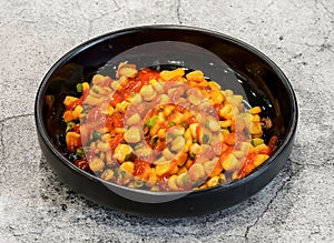 corn sauteed in butter or bap xao bo served in dish isolated on grey background top view of singapore seafood