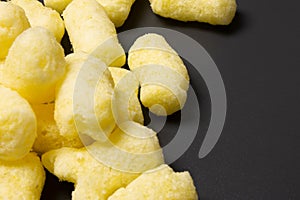 Corn sticks on a dark background