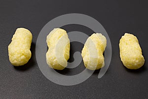 Corn sticks on a dark background