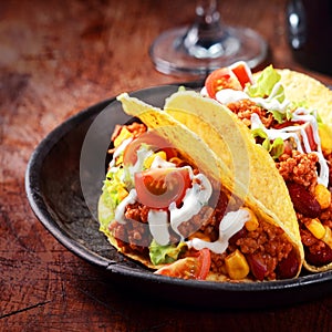 Corn tortilla or taco with meat and vegetables