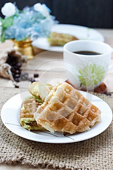 Corn vanilla and pandan thai waffle on white dish , selection f