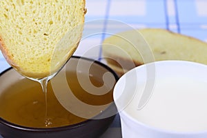 Cornbread with honey on blue napkin