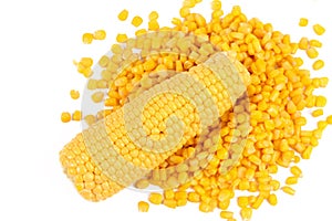 Corncob on a bulk of corn grains.