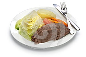 Corned beef and cabbage isolated on white background photo