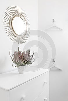 Corner of a Bedroom of a vacation rental house with white chests