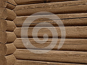 Corner with big wooden logs outdoors, sepia