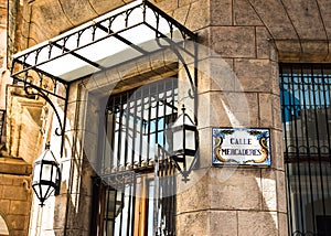 The corner of the busy Mercaderes Street, in Havana. photo