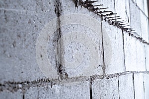 Corner of a concrete block wall in a building under construction