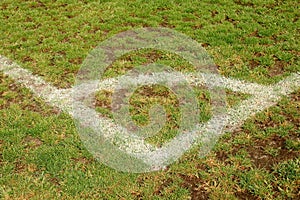 Corner of football playground, natural grass