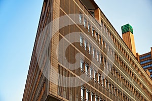 Corner of a modern wooden building. Contemporary ecological lifestyle showing a wooden building facade well isolated