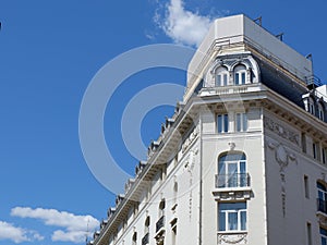 Corner of neoclassical elegant building in Barrio de las letras district downtown Madrid, Spain photo