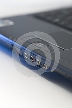 Corner of notebook, with blueish glow, vertical