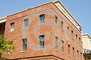 Corner of old Brick Building with Windows