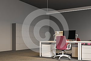 Gray open plan office corner, lockers