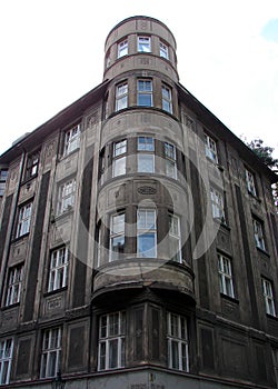 Corner oriel windows tower of old residential building at Maiselova Street, in Josefov, Prague, Czechia