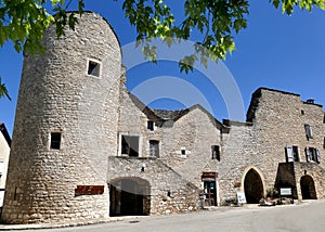 Corner tower and houses built in the ramparts of La Cavalerie, former commandery of the Templars