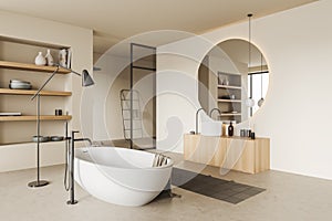 Corner view on bright bathroom interior with large round mirror