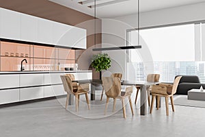 Corner view on bright kitchen room interior with panoramic window