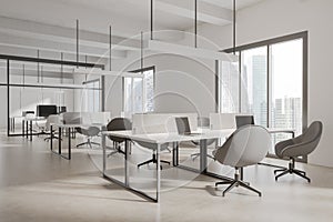 Corner view on bright office interior with panoramic windows