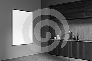 Corner view on dark kitchen interior with empty white poster