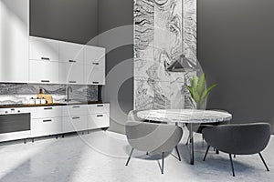 Corner view on dark studio dining and kitchen room interior