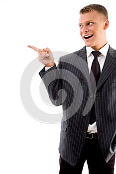Corner view of pointing businessman