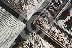 Corners of ornamental vintage picture frames. Baroque style. Details of classic wooden art frames.