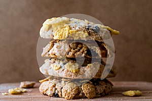 Stack of Cornflake Cookies on wooden surface.