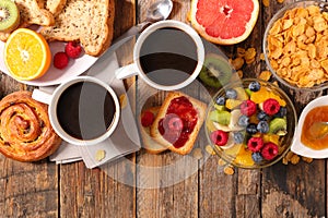 Cornflake, fresh fruit, bread and coffee