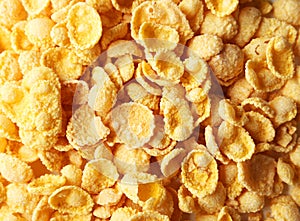 Cornflakes background, close up, yellow