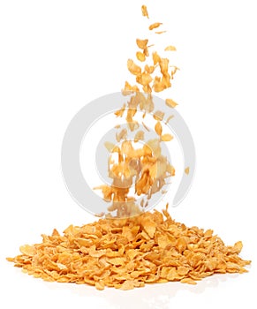 Cornflakes falling into a pile,