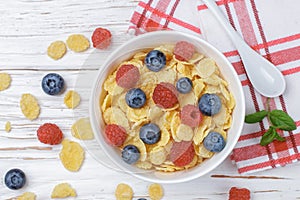 Cornflakes with fresh berries raspberry and blueberry