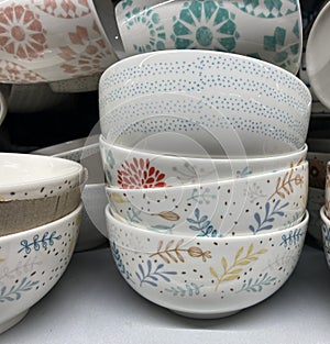 Cornflakes, porridge or oat flakes bowls on the selfservice store shelf photo