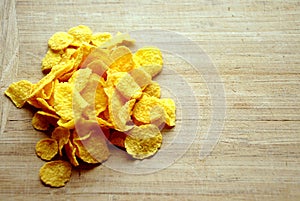 Cornflakes on wood cutboard