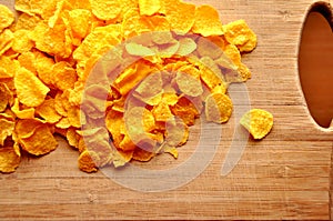 Cornflakes on wood cutboard