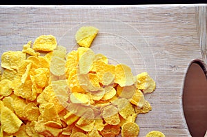 Cornflakes on wood cutboard